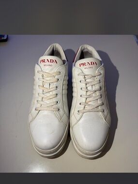 Prada White Leather Low-Top Sneakers with Red Logo
